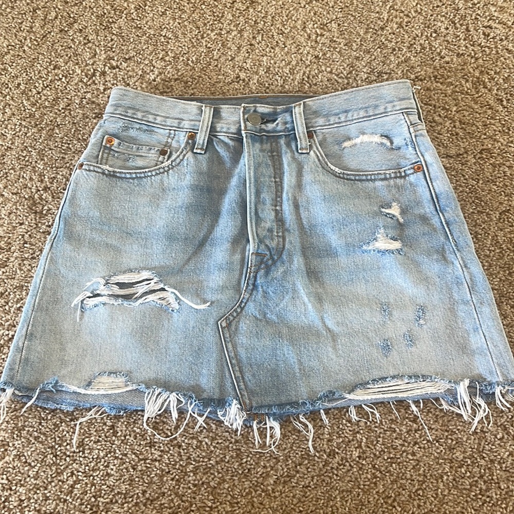 Levi’s light wash distressed denim skirt.